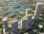 Aerial view of the Serenia District architectural composition, showing the six-tower masterplan, lakeside setting and surrounding greenery in Jumeirah Islands.