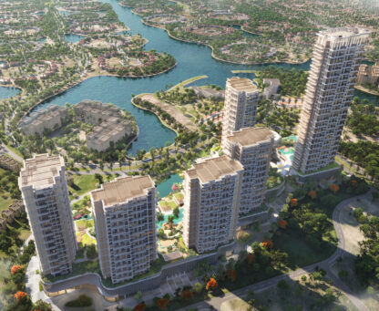 Aerial view of the Serenia District architectural composition, showing the six-tower masterplan, lakeside setting and surrounding greenery in Jumeirah Islands.
